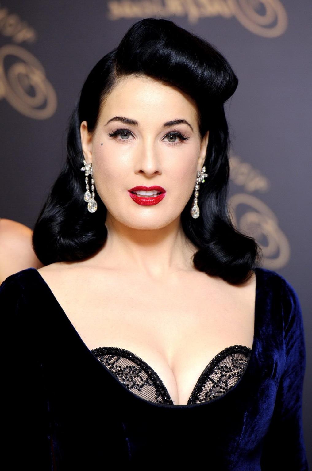10P Dita Von Teese bra peak at the launch of her lingerie line range at Debenhams in