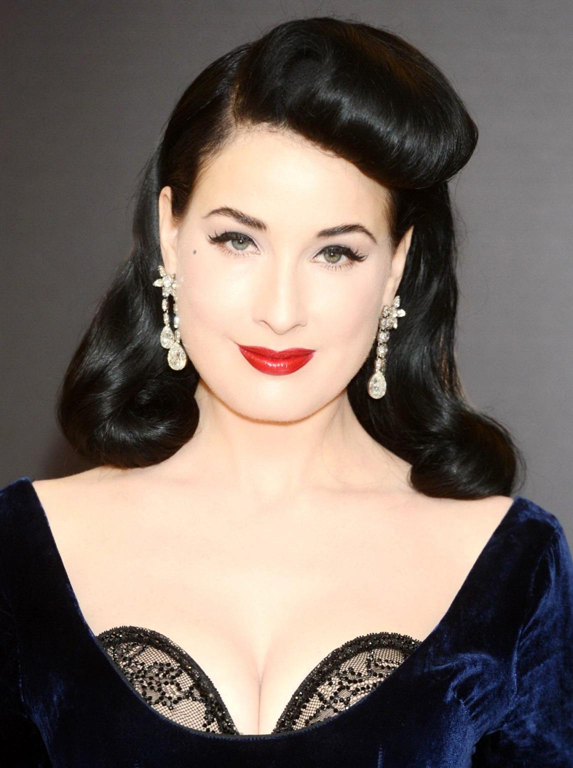 10P Dita Von Teese bra peak at the launch of her lingerie line range at Debenhams in