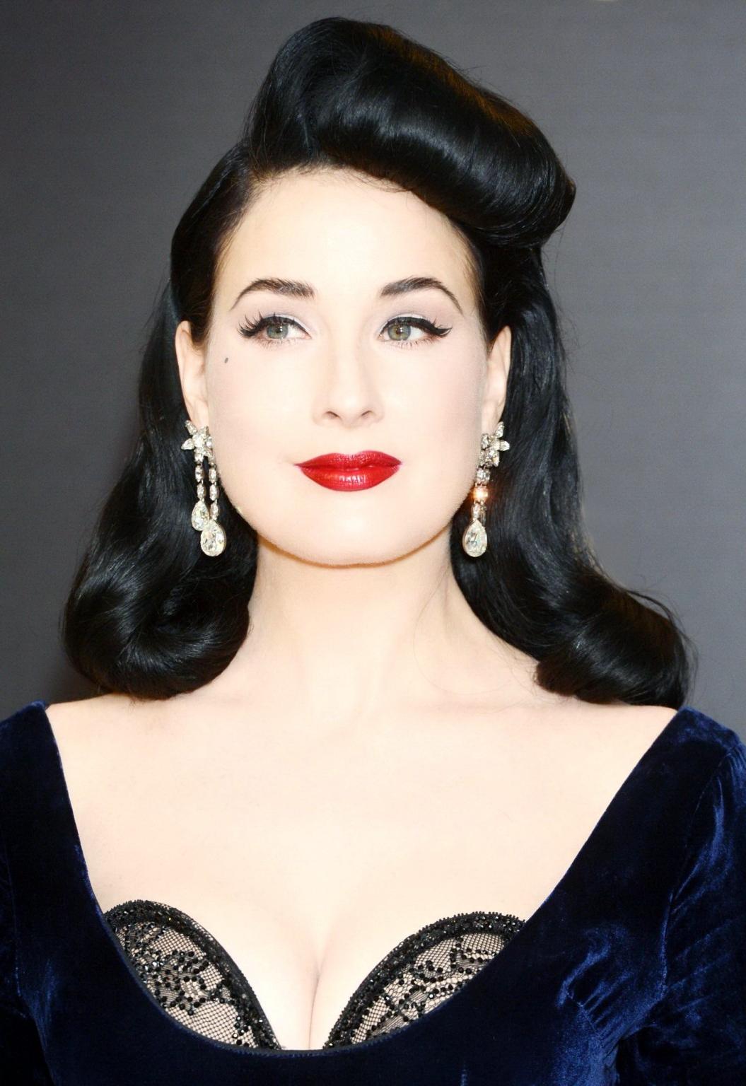 10P Dita Von Teese bra peak at the launch of her lingerie line range at Debenhams in