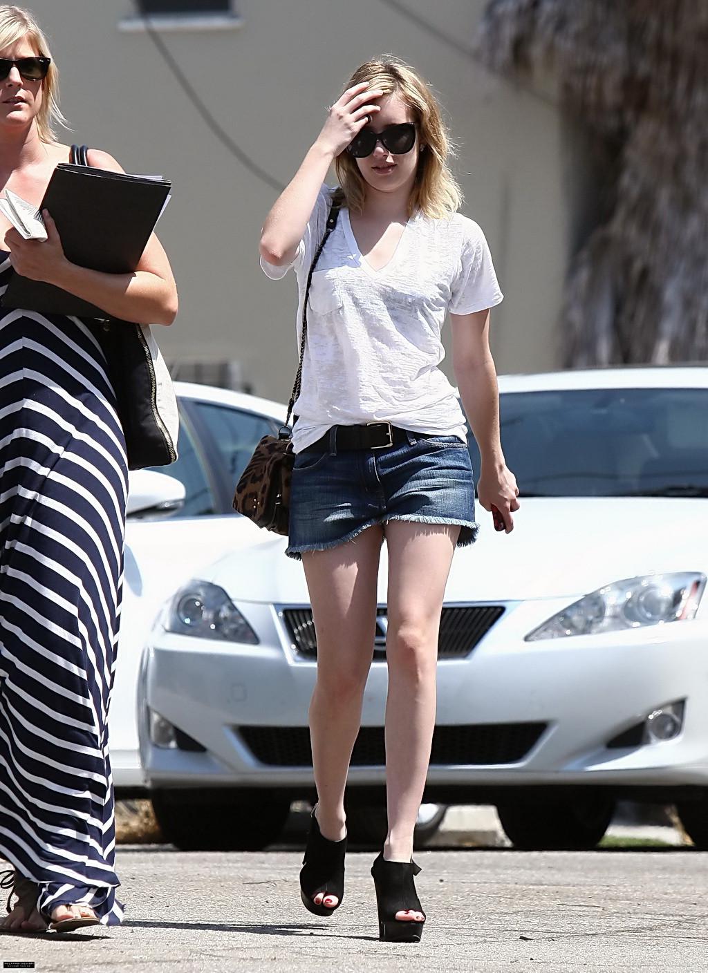 10P Emma Roberts wearing see-through to bra and denim shorts at the gas station in W
