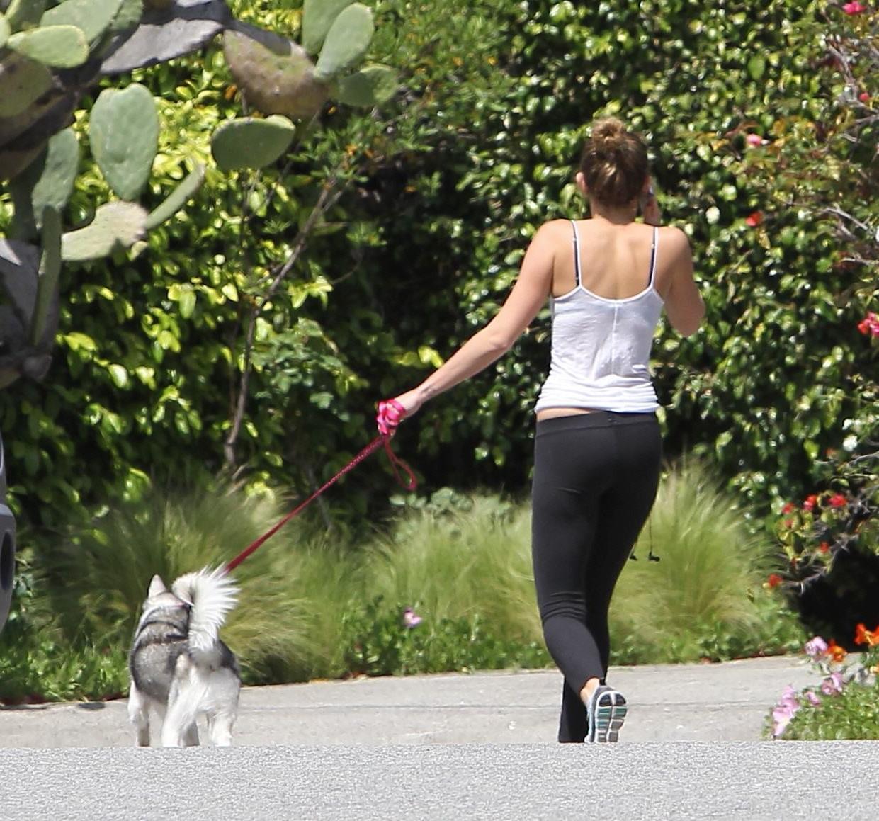 16P Miley Cyrus see through to bra while running out her dog in Toluca Lake