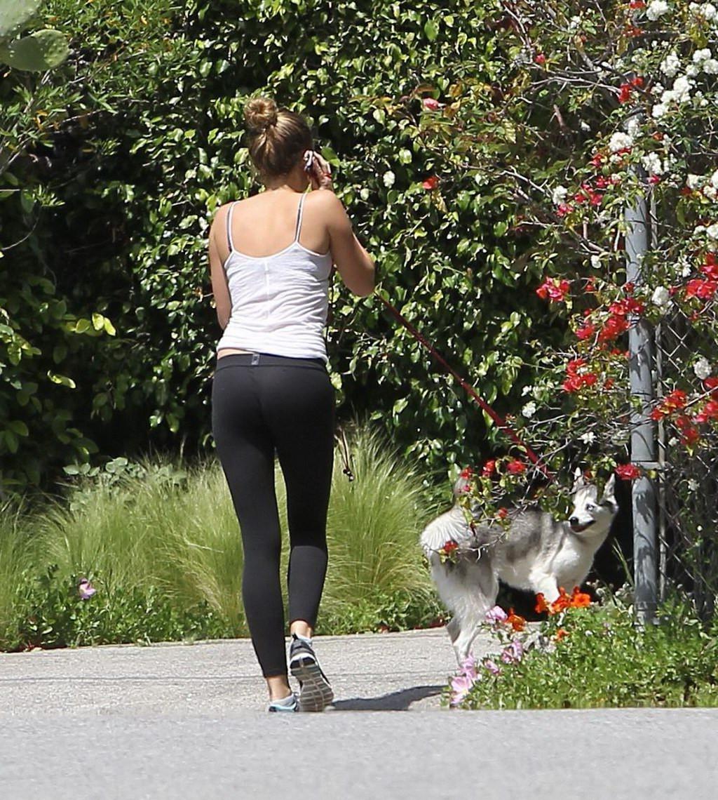 16P Miley Cyrus see through to bra while running out her dog in Toluca Lake