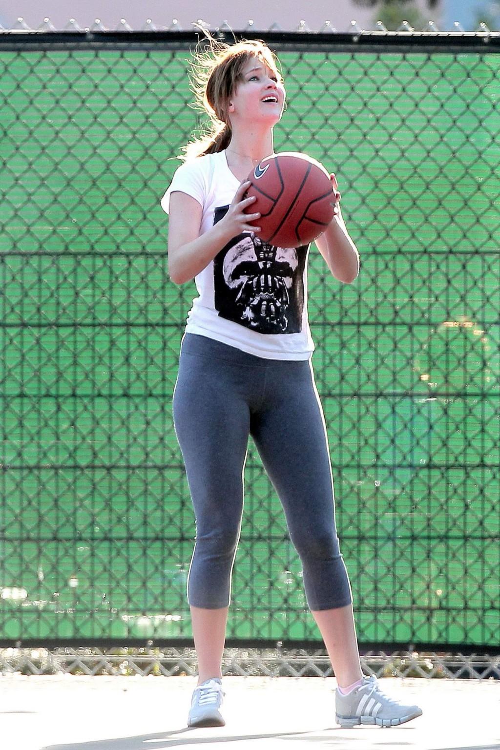16P Jennifer Lawrence shows off her ass playing basketball in tight sweatpants