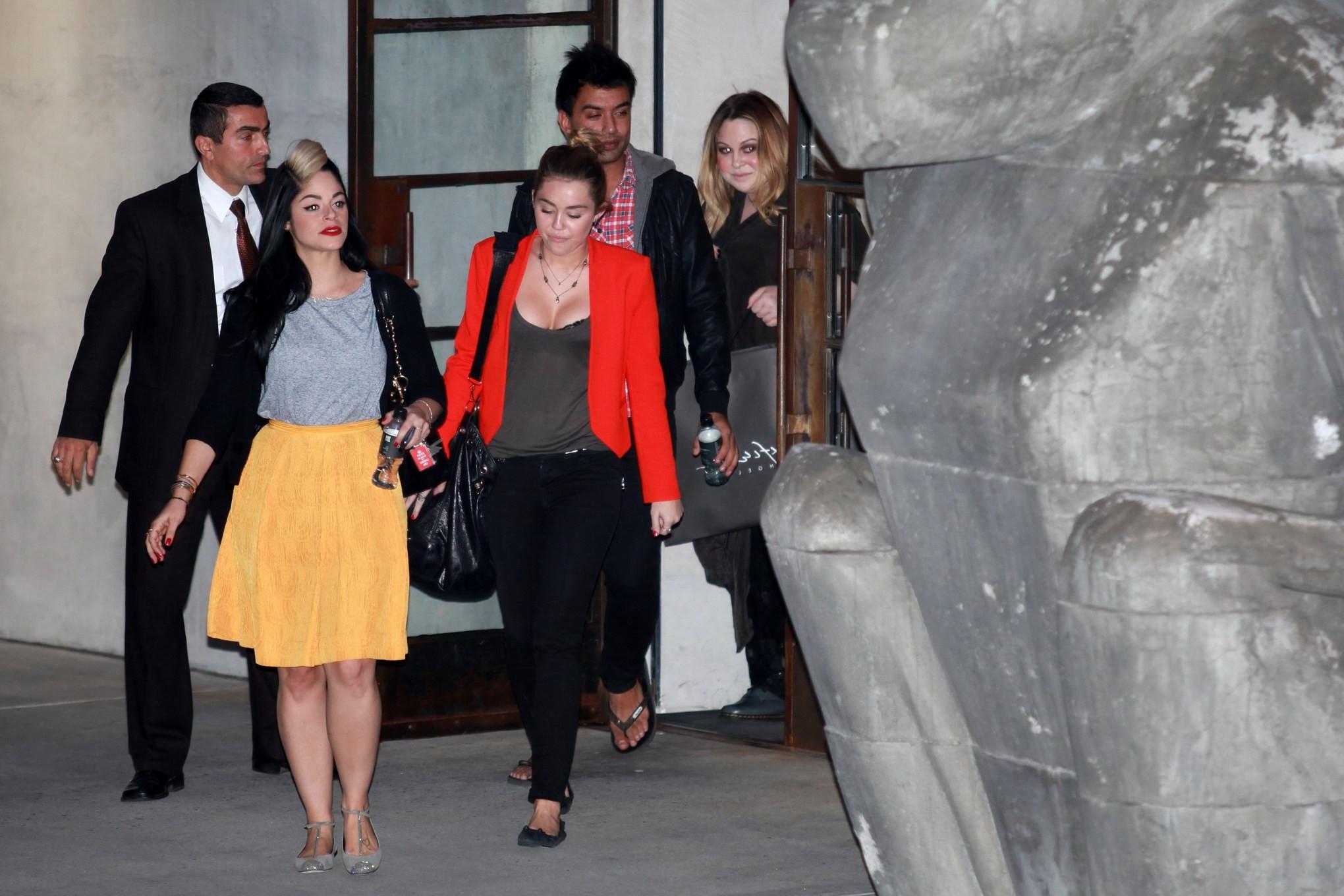 16P Miley Cyrus busty  bra peak out in Los Angeles