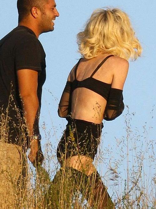 16P Lindsay Lohan exposing her sexy body and huge boobs just in bra