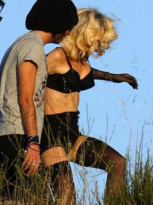 16P Lindsay Lohan exposing her sexy body and huge boobs just in bra