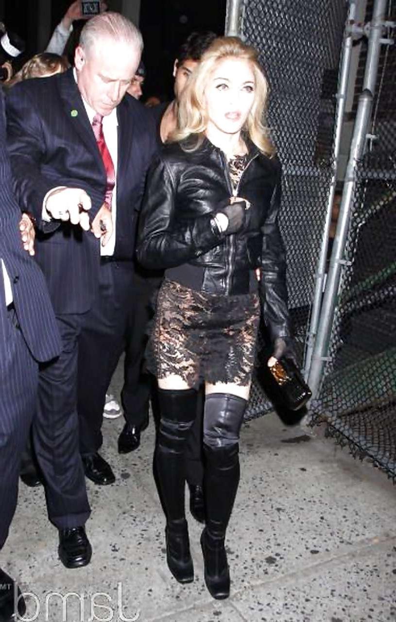 16P Madonna showing her tits in see thru bra and pubic hair on beach paparazzi pictu