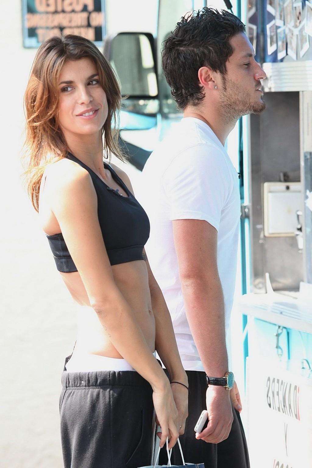16P Elisabetta Canalis in sports bra  sweatpants showing off her abs outside the DWT