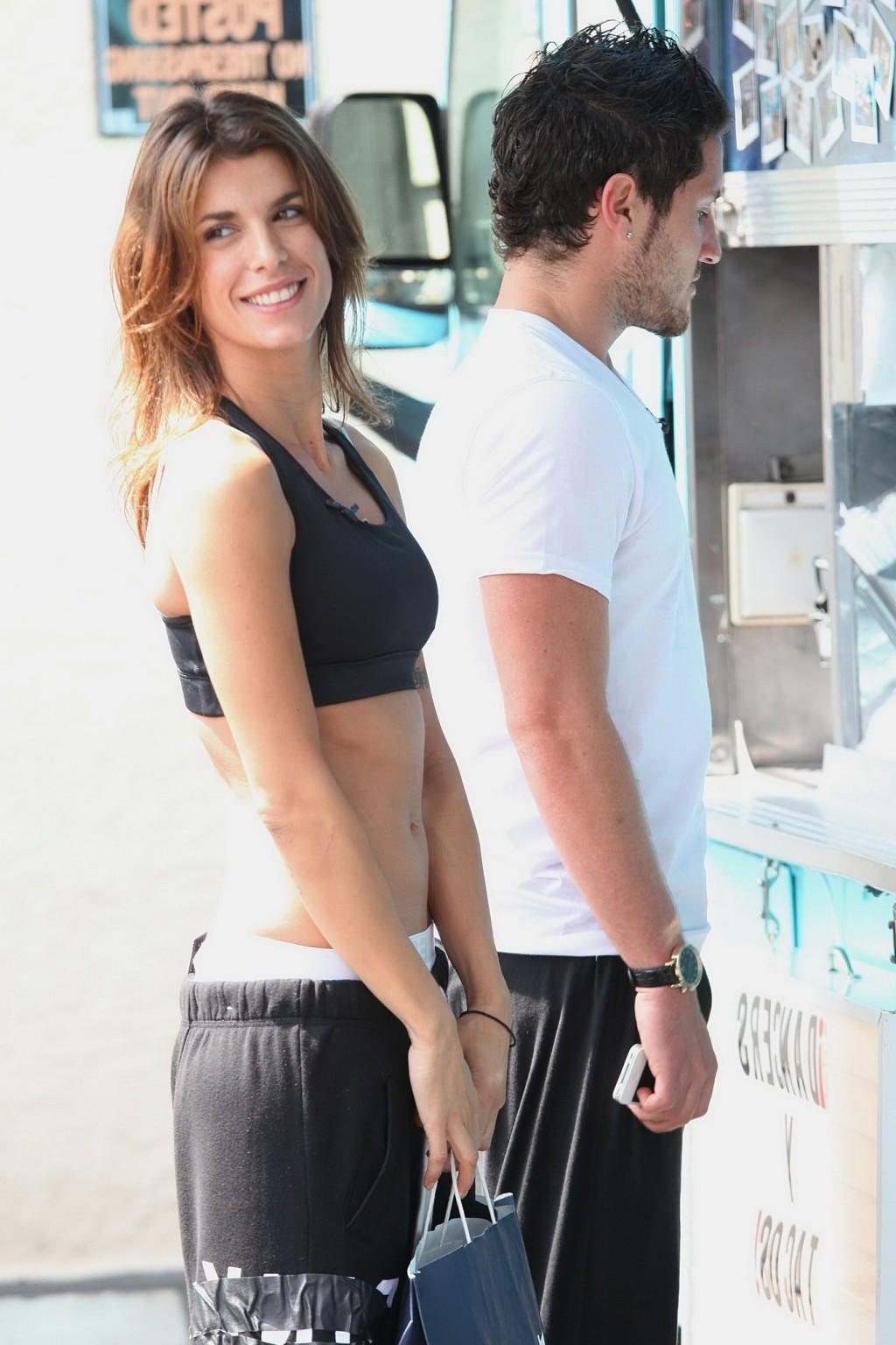 16P Elisabetta Canalis in sports bra  sweatpants showing off her abs outside the DWT