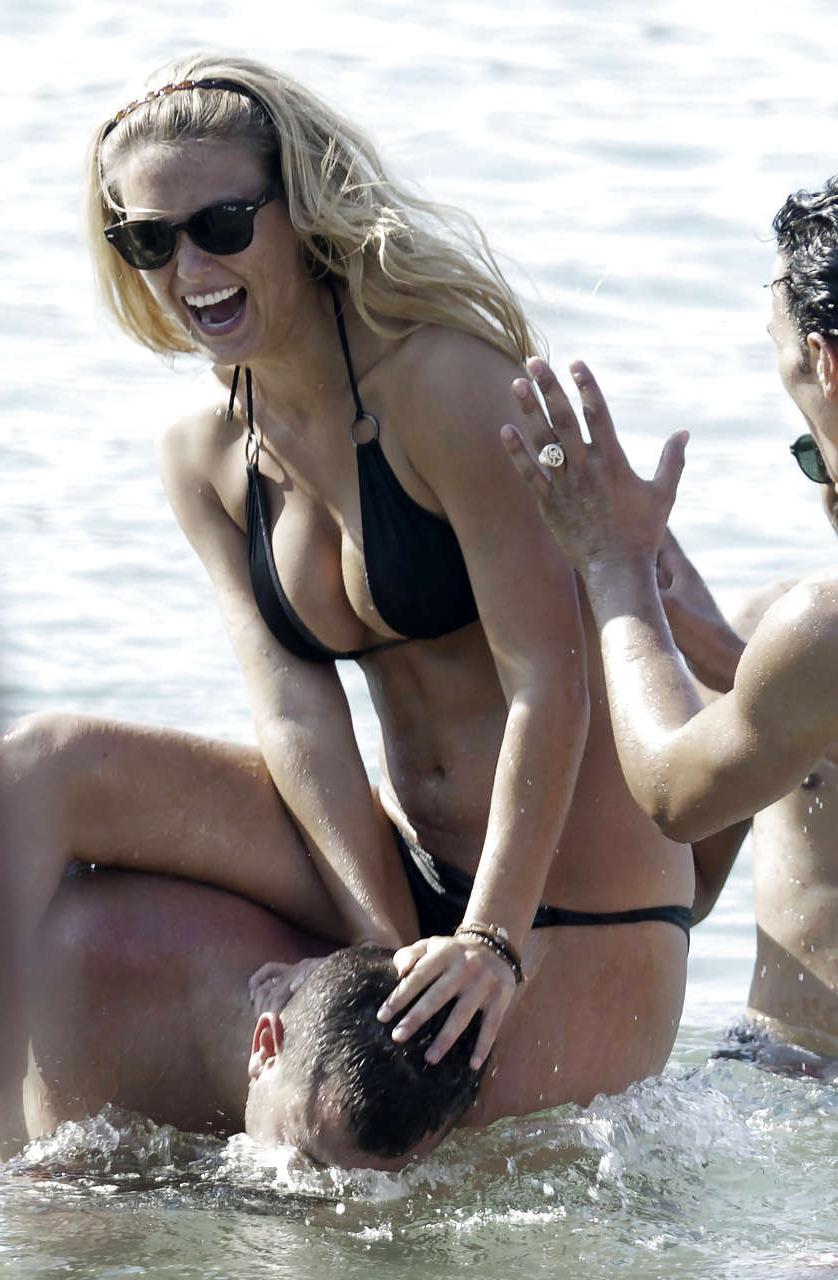 15P Bar Refaeli showing her fantastic ass in blue bikini and playing on beach