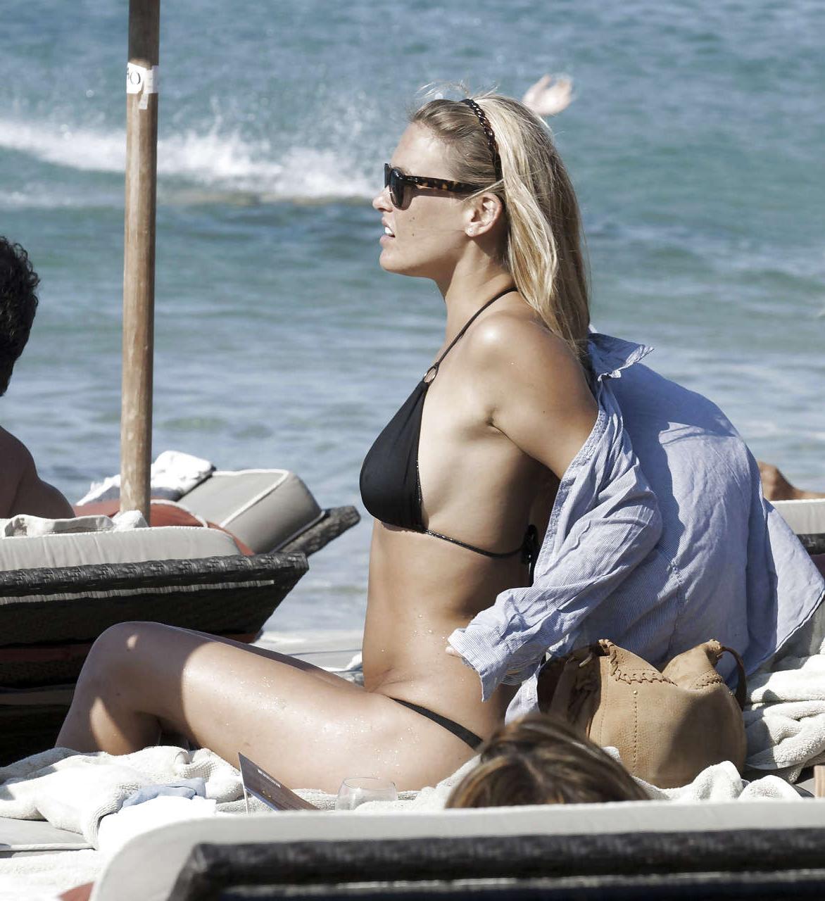 15P Bar Refaeli showing her fantastic ass in blue bikini and playing on beach