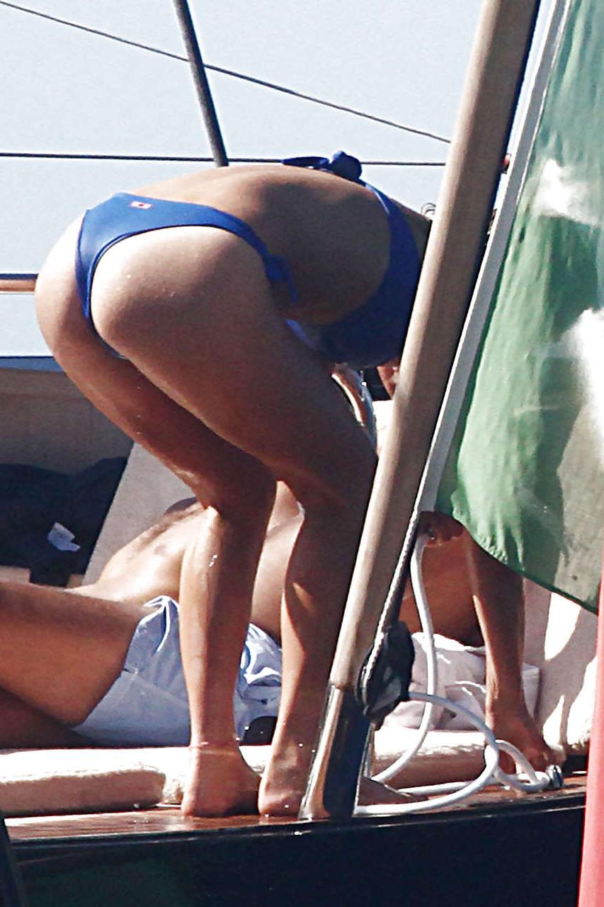 15P Bar Refaeli showing her fantastic ass in blue bikini and playing on beach