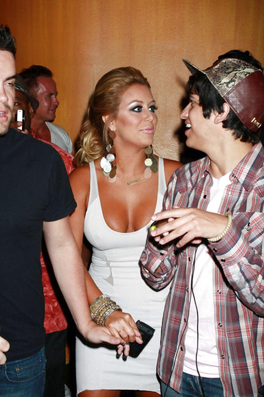 16P Aubrey O'Day selfshoting in red bra and very leggy in white mini skirt