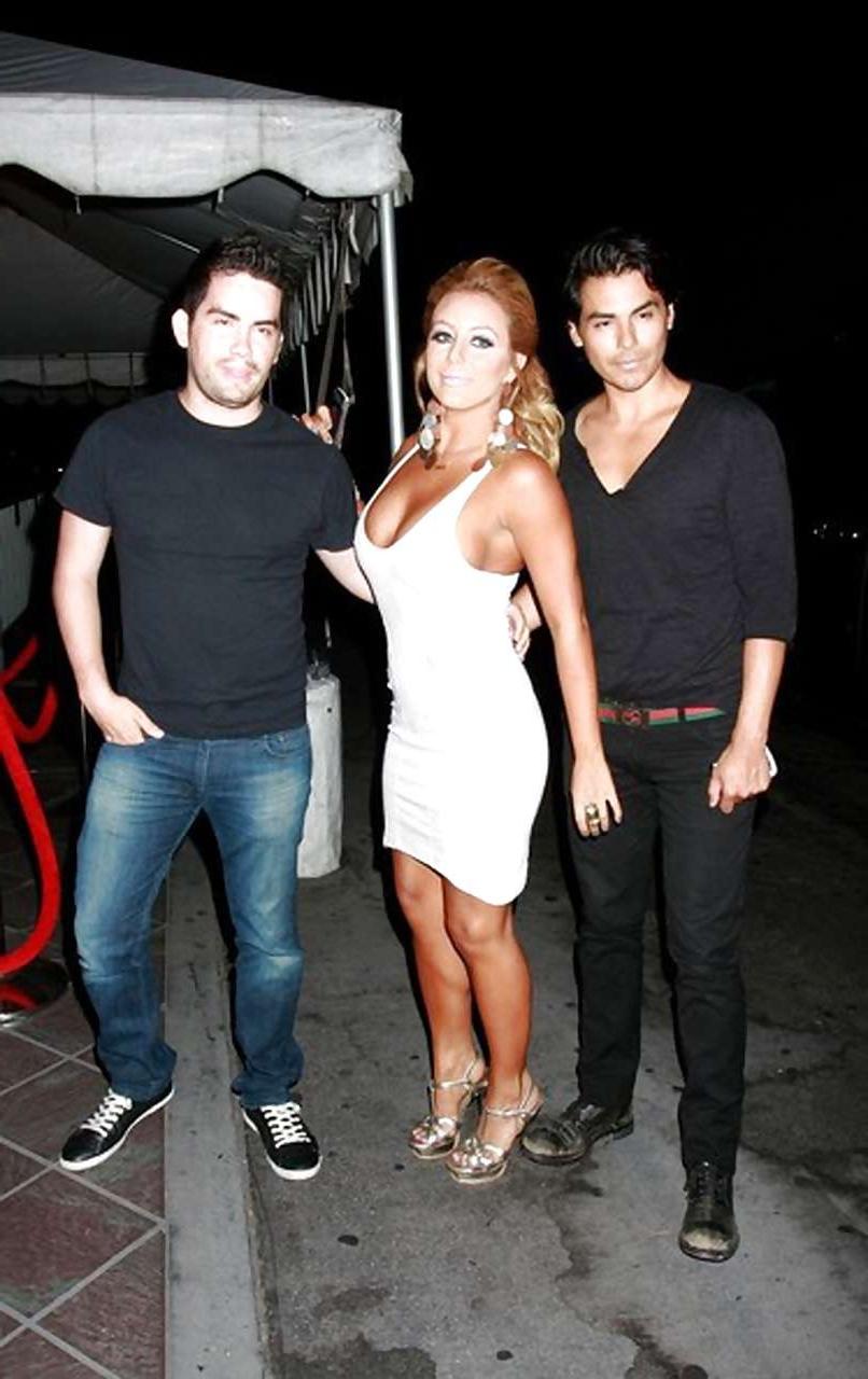 16P Aubrey O'Day selfshoting in red bra and very leggy in white mini skirt
