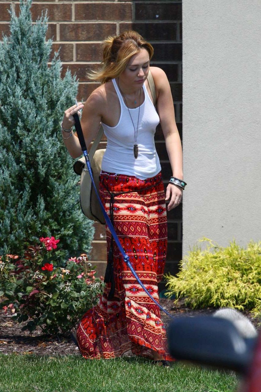 16P Miley Cyrus fucking sexy and hot bra peek paparazzi photos on street