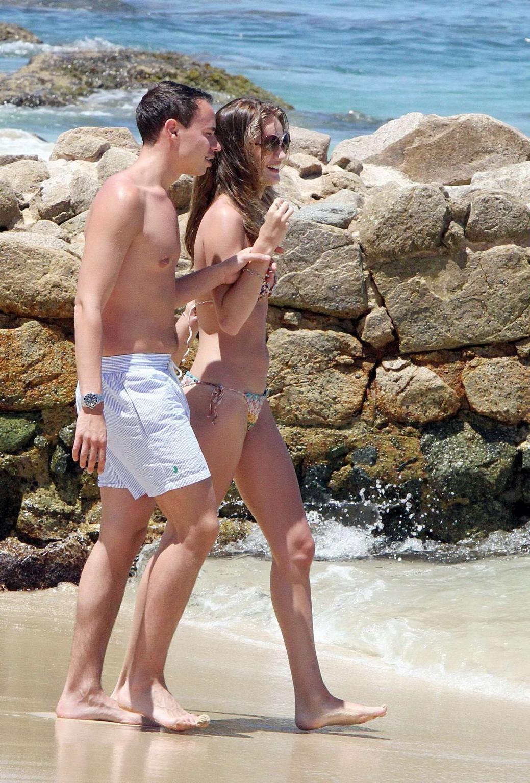 16P Rosie Huntington-Whiteley showing off her killer bikini body on a Mexican beach