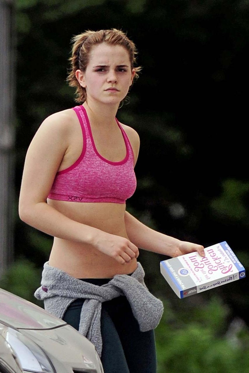 16P Emma Watson exposing sexy body and nice tits in sports bra on street