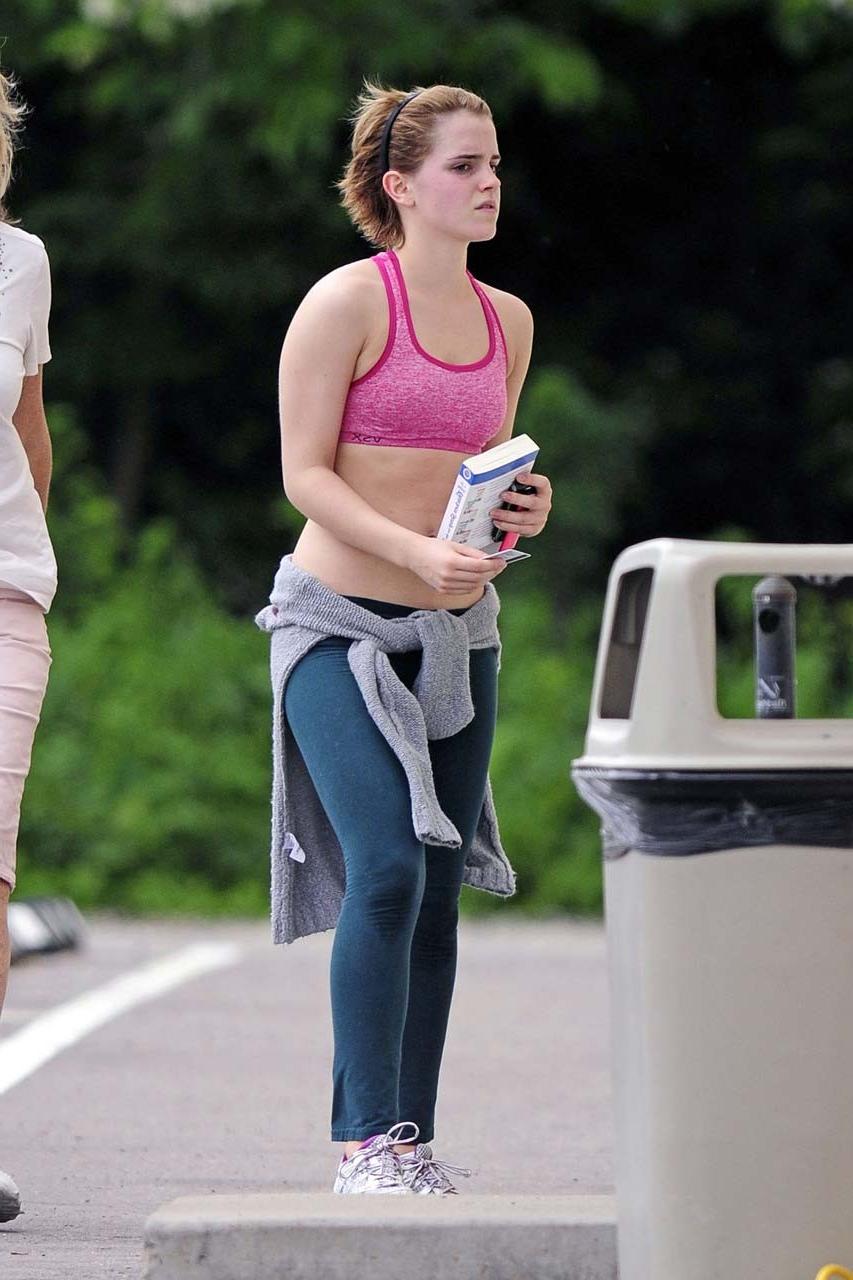 16P Emma Watson exposing sexy body and nice tits in sports bra on street