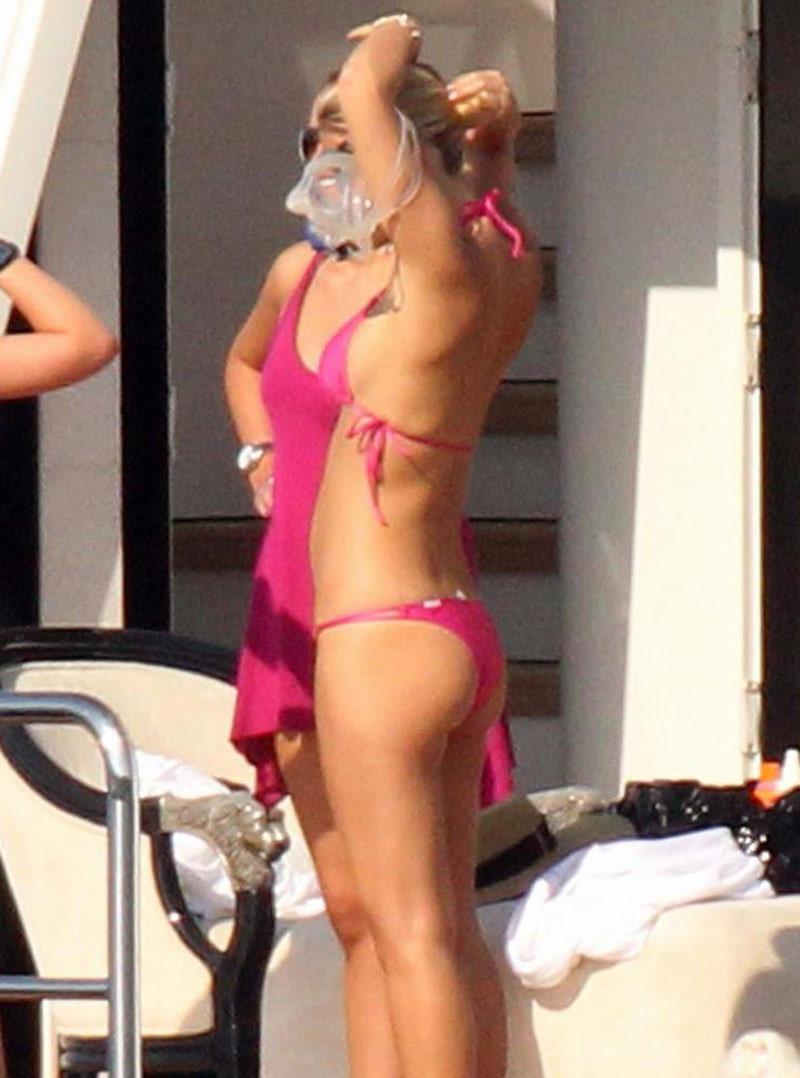 16P Bar Rafaeli showing her cute ass in thong bikini