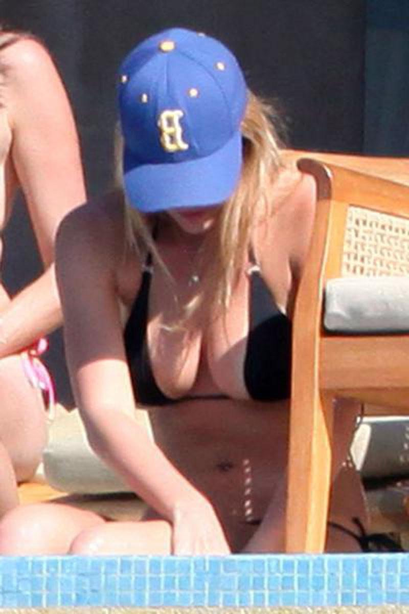 16P Bar Rafaeli showing her cute ass in thong bikini