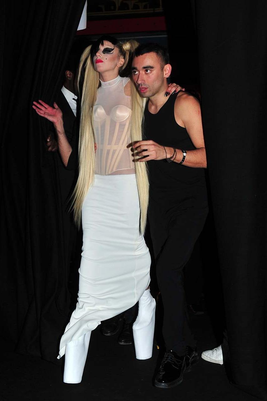 16P Lady Gaga in see thru to bra dress on some event paparazzi pictures
