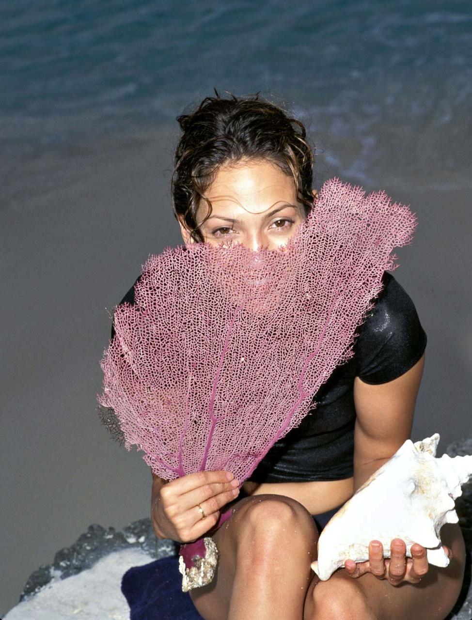 10P Jennifer Lopez showing her bra and panties in see thru dress and posing sexy