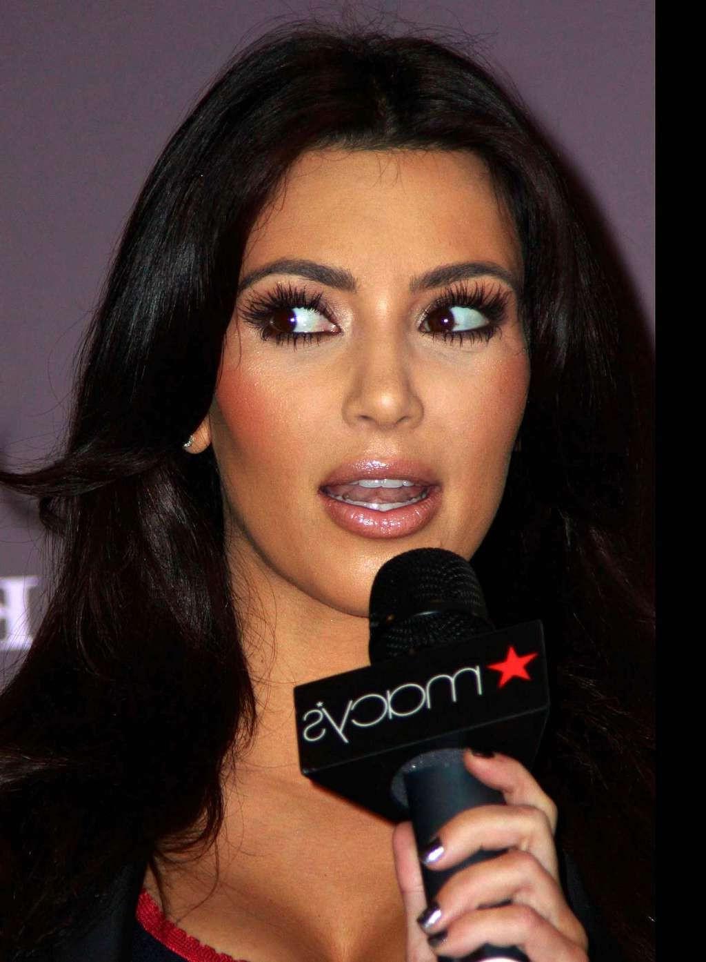 10P Kim Kardashian sexy in see thru to bra top and leggy paparazzi shoots