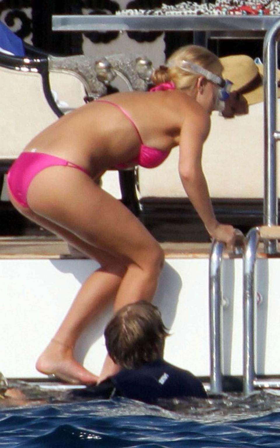 11P Bar Refaeli looking very sexy in red bikini on yacht paparazzi pictures