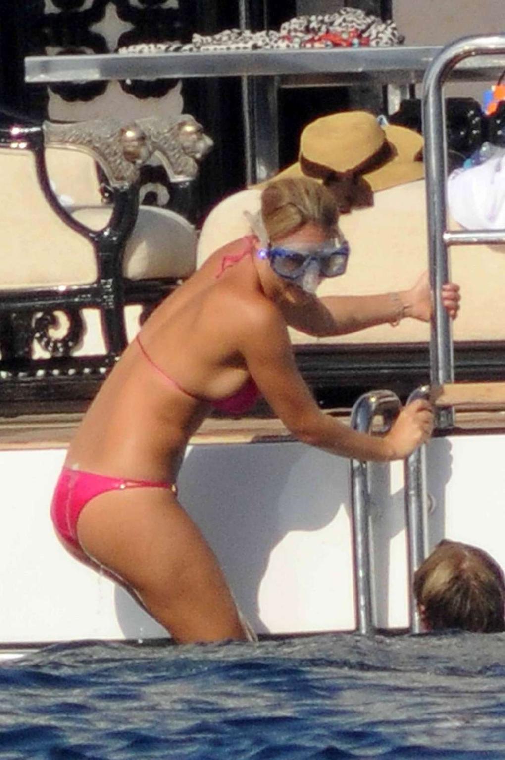 11P Bar Refaeli looking very sexy in red bikini on yacht paparazzi pictures