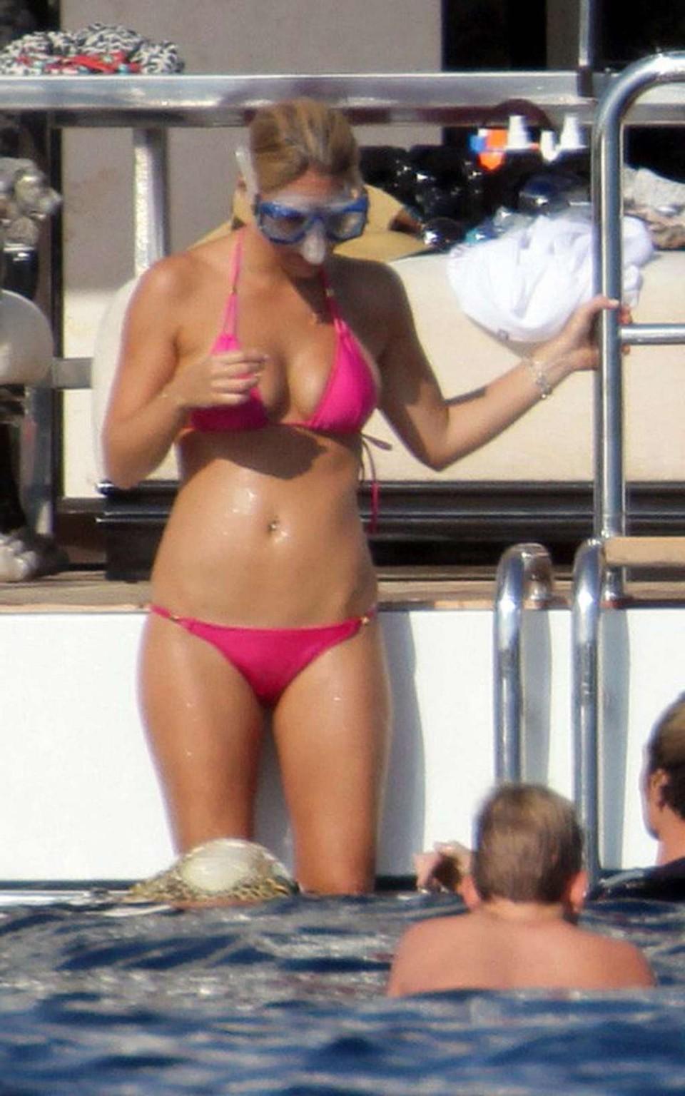 11P Bar Refaeli looking very sexy in red bikini on yacht paparazzi pictures