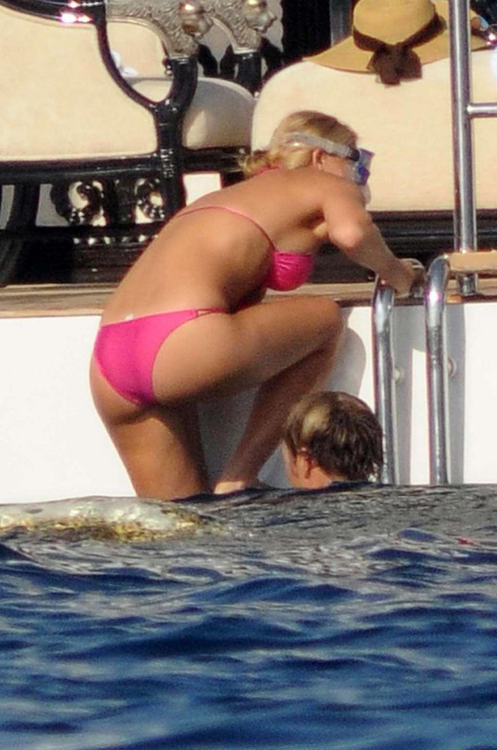 11P Bar Refaeli looking very sexy in red bikini on yacht paparazzi pictures