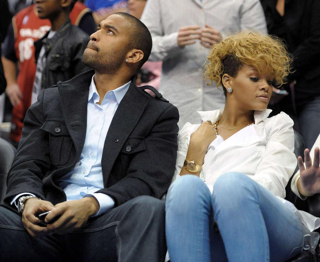 16P Rihanna showing her sexy legs in a jeans on basketball game