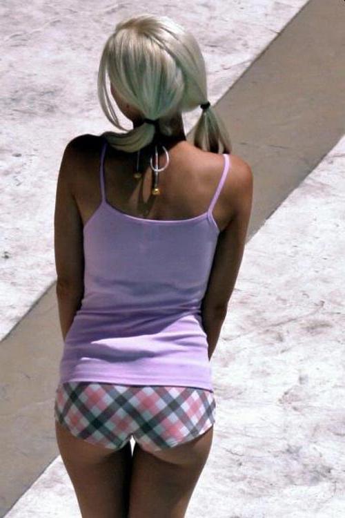 15P Holly Madison skimpy bikini and nice topless