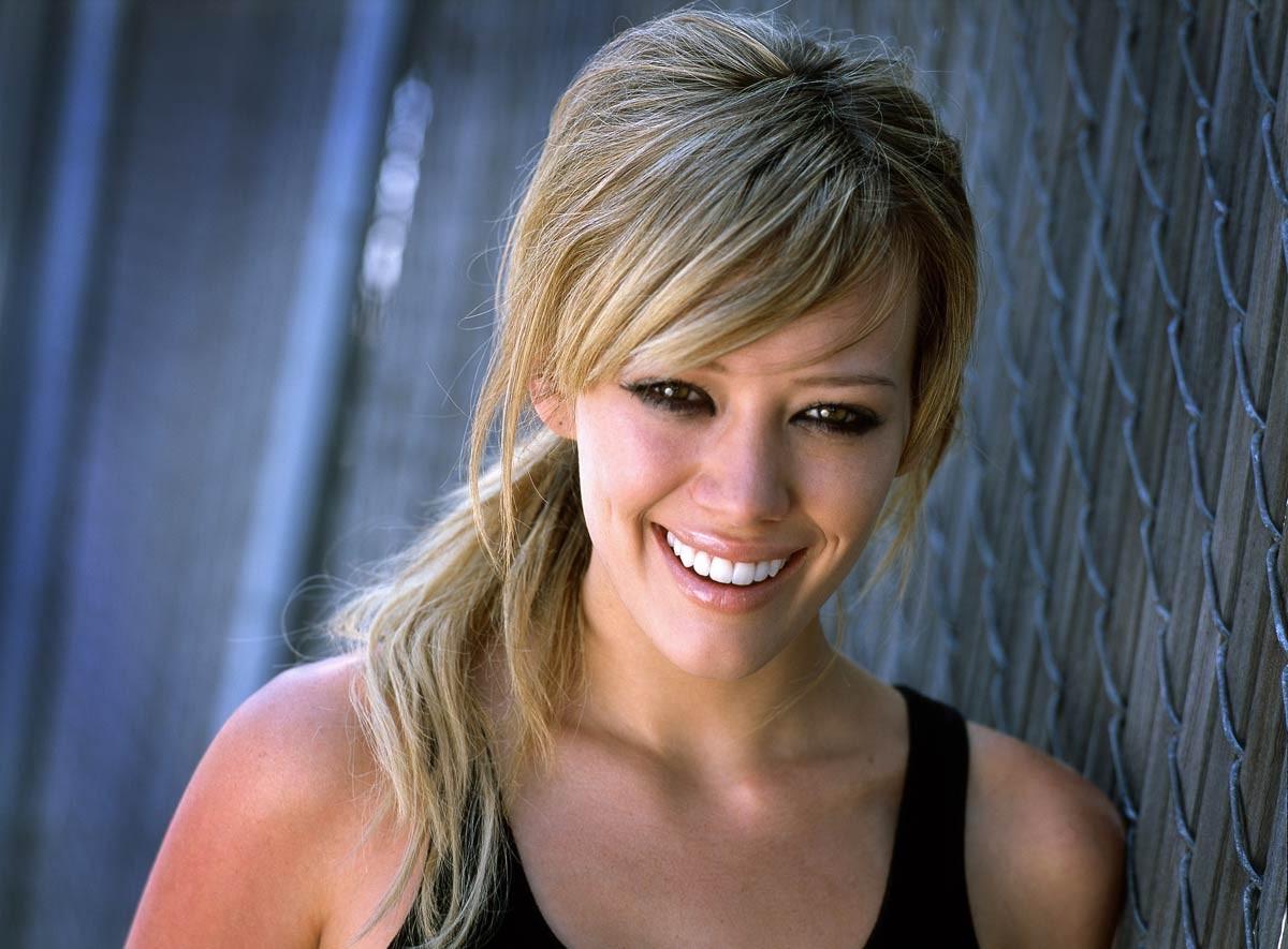 14P Hilary Duff showing off her pokies in sexy bikini