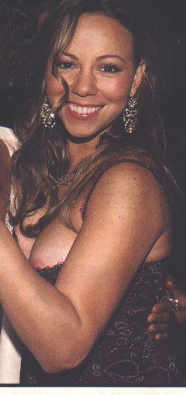 15P Celebrity Mariah Carey showing her nice ass in nasty bikini