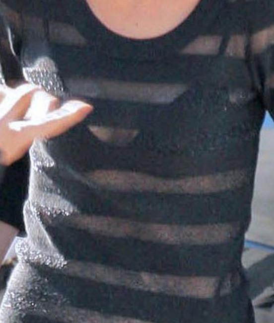 15P Celeb Katie Holmes see through bra and nice long legs