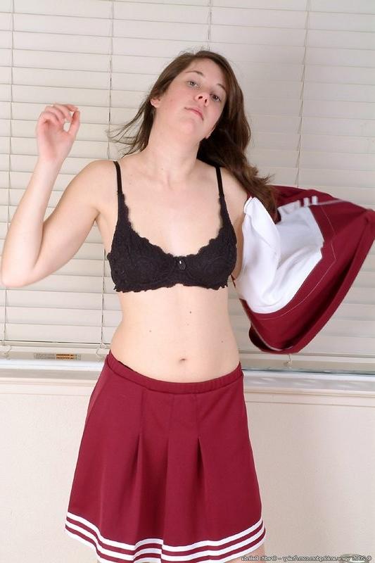 15P Big pussy girl strips off her cheerleader uniform