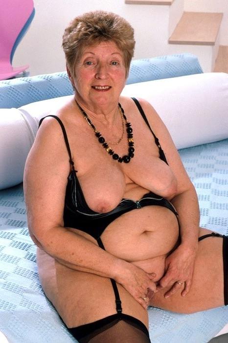 16P Plump grandma spreads her smoothly shaved cunt