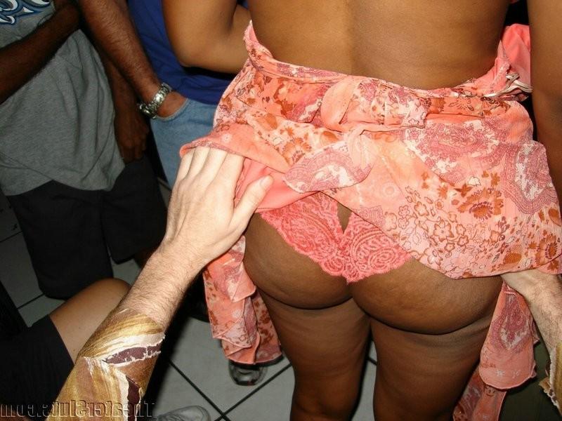 20P Busty ebony mama taking care all the cummers at porn theater