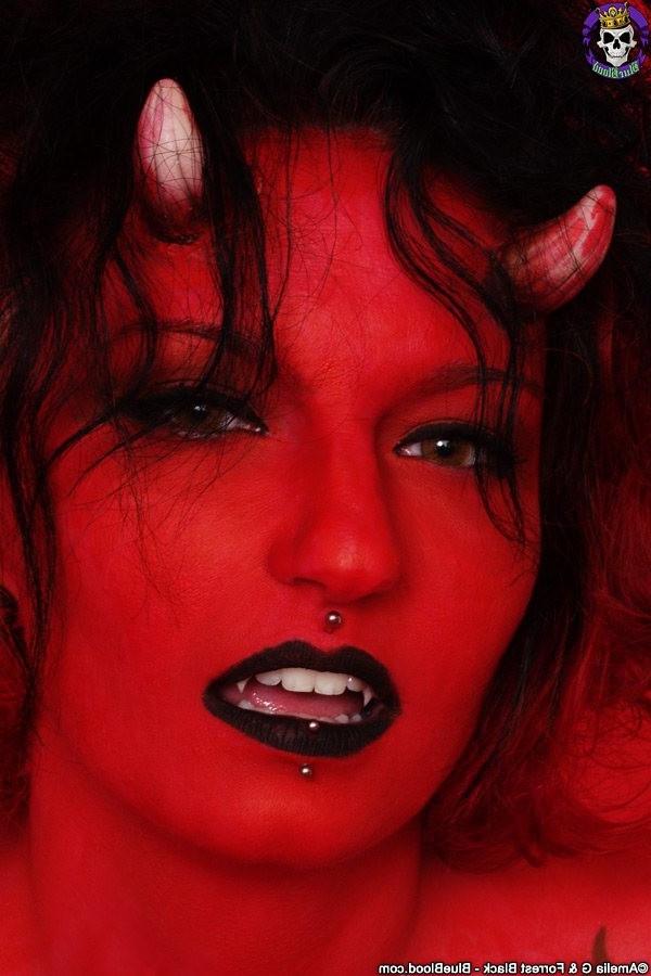 16P Busty devil girl shows her tight pierced cunt