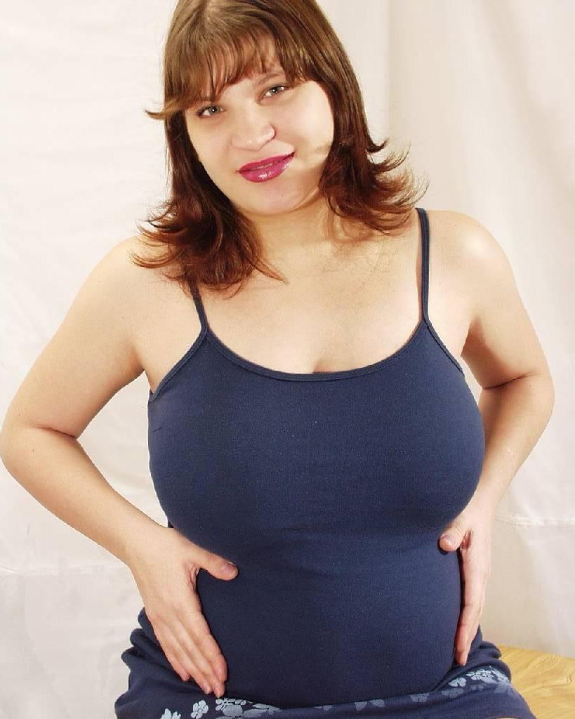 20P Horny busty prego loves to tease while spreading her pussy