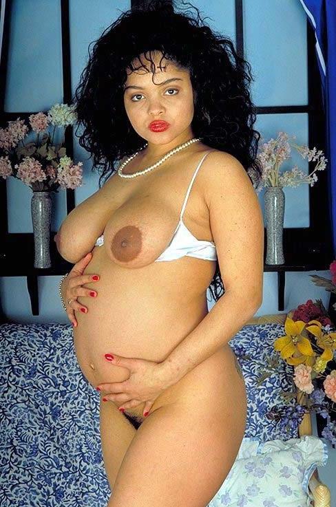 16P Horny busty pregnant babe loves teasing while posing naked