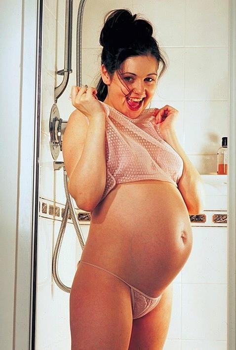 20P Horny prego babe loves to tease while spreading her pussy