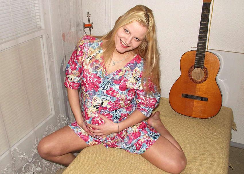 20P Pregnant blonde spreads legs on bed