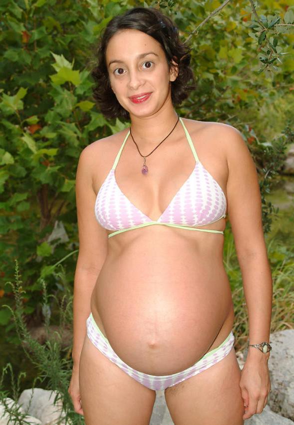 20P Pregnant cutie posing nude by river