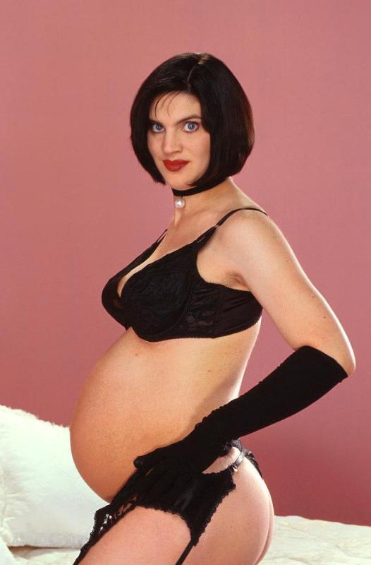 20P Lovely pregnant brunet in stockings