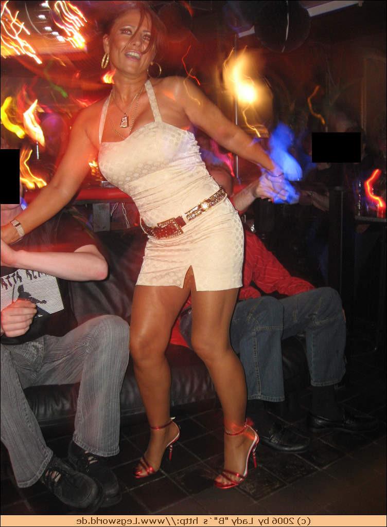 12P Lady in stockings teasing strangers in the bar