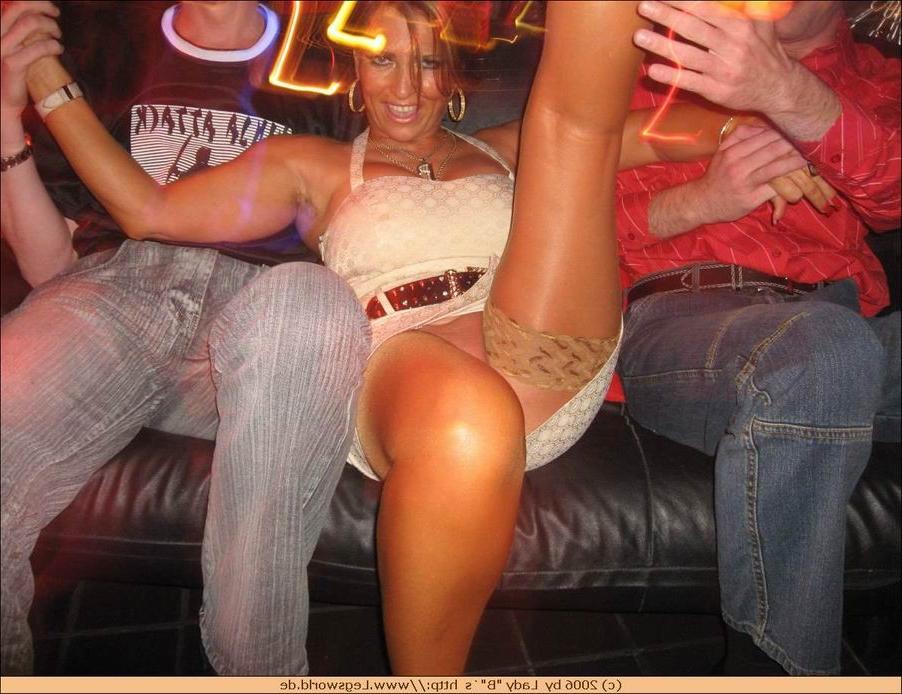 12P Lady in stockings teasing strangers in the bar