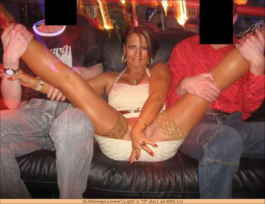 12P Lady in stockings teasing strangers in the bar