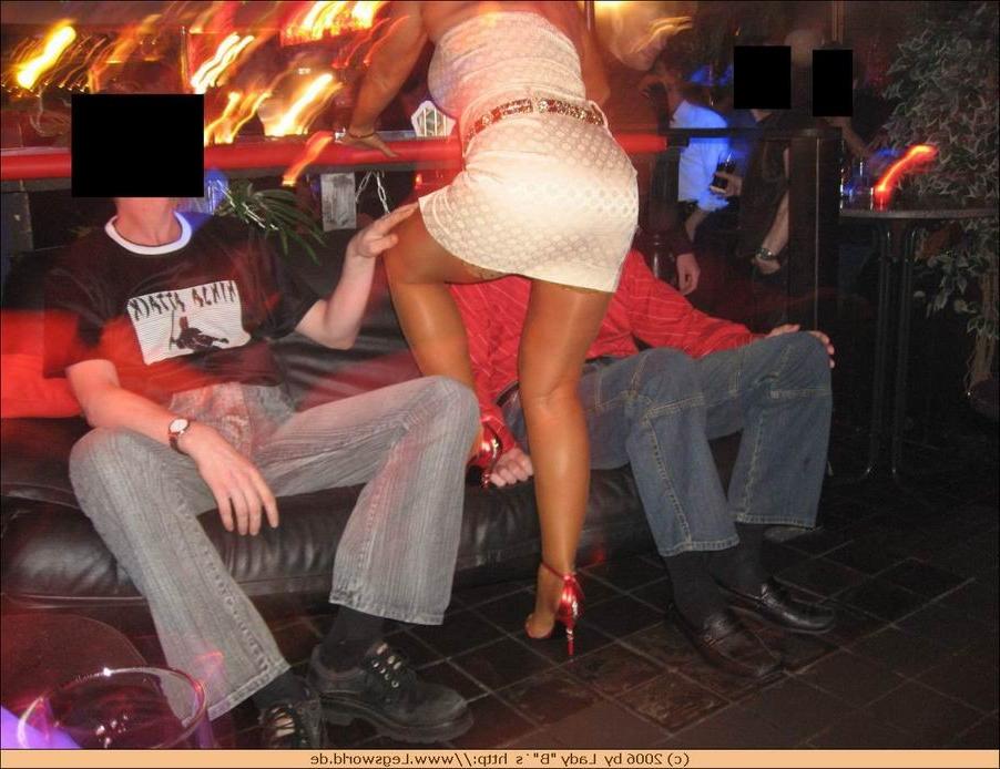 12P Lady in stockings teasing strangers in the bar